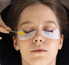 Top view woman wearing eye patches