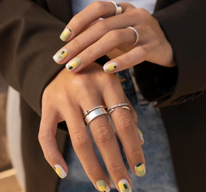Woman showing her nail art fingernails