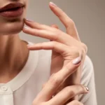 Young model demonstrating expensive ring